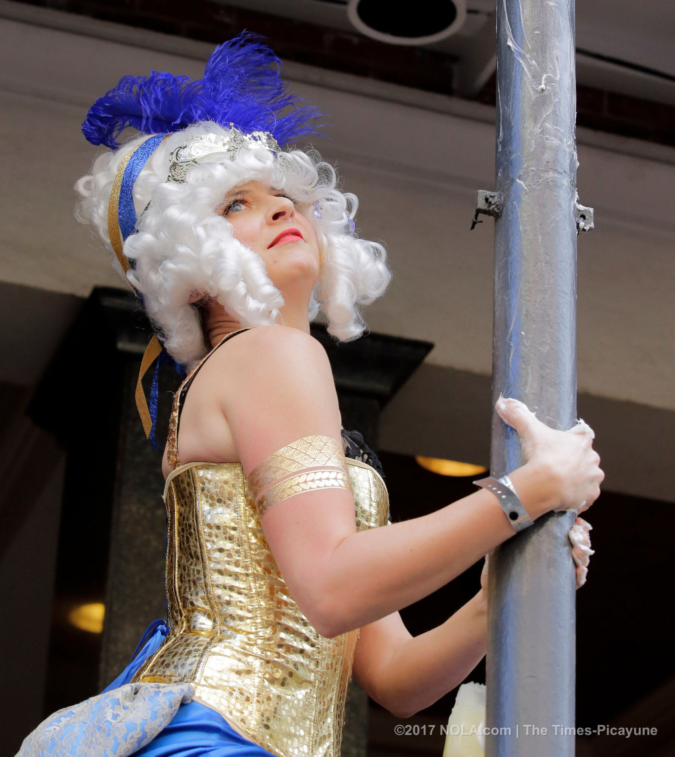 Only on Bourbon Street: Greasing of the Poles for Mardi Gras